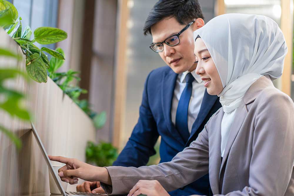 Two TechStaffing recruiters discussing